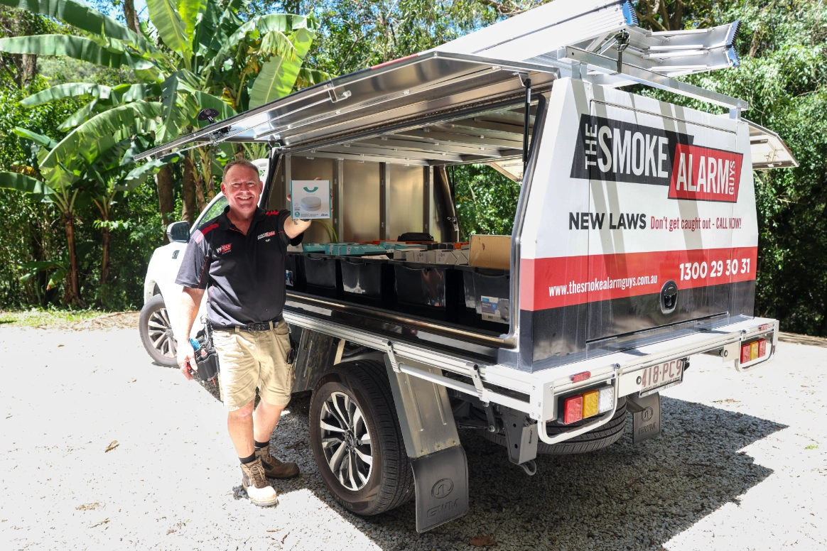 professional-smoke-alarm-installation-technician-vehicle